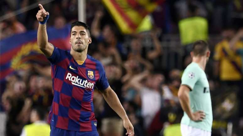 Suárez marcou duas vezes para dar a vitória ao time catalão (Foto: AFP)