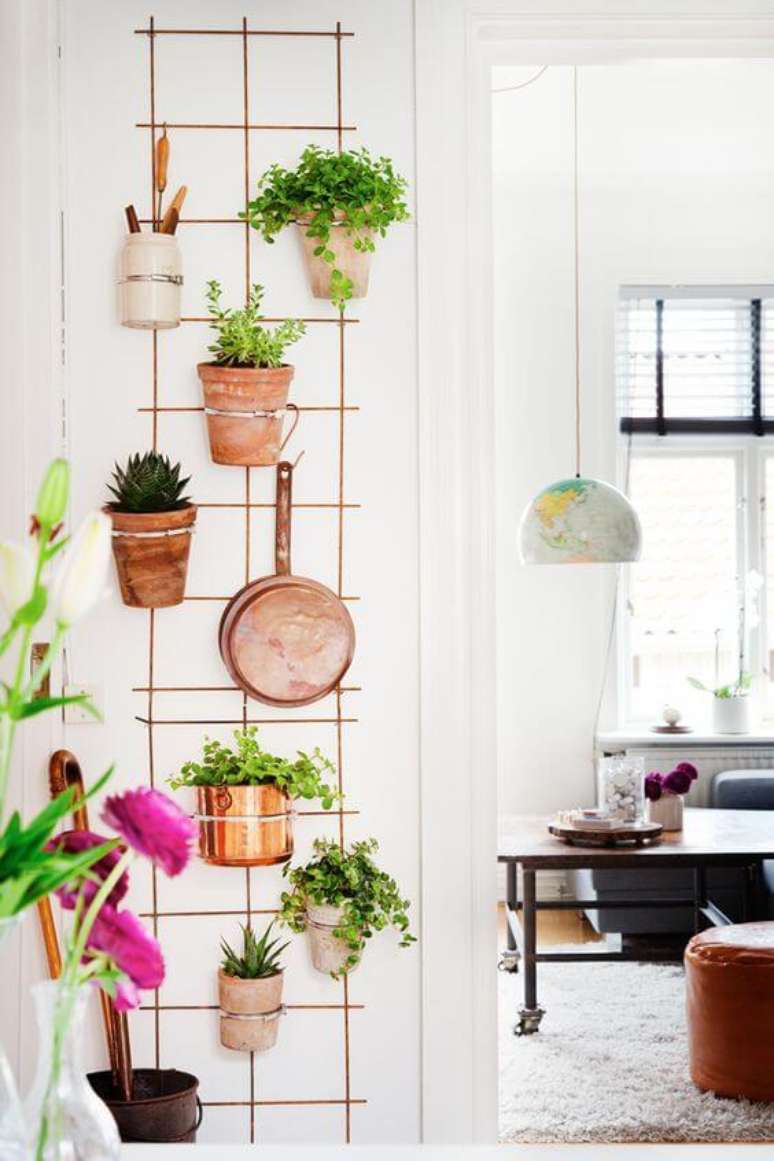 19. Suporte para plantas de ferro na decoração de casa – Por: Tour de Espaço