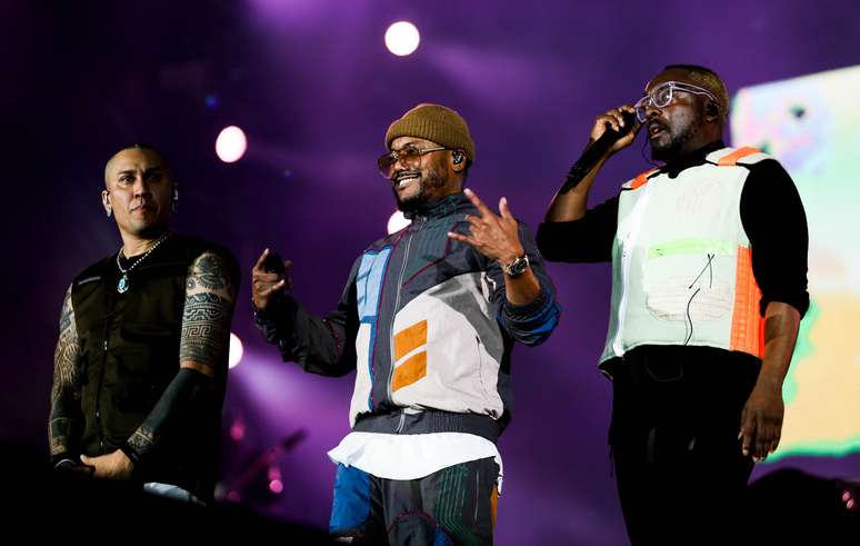 Taboo, Apl.de.Ap e Will.I.Am durante o show da banda Black Eyed Peas.