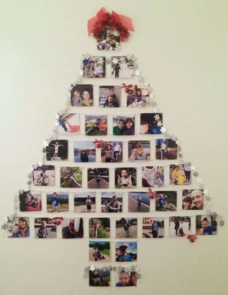 30. Árvore de Natal na parede feita com fotos. Fonte: Pinterest