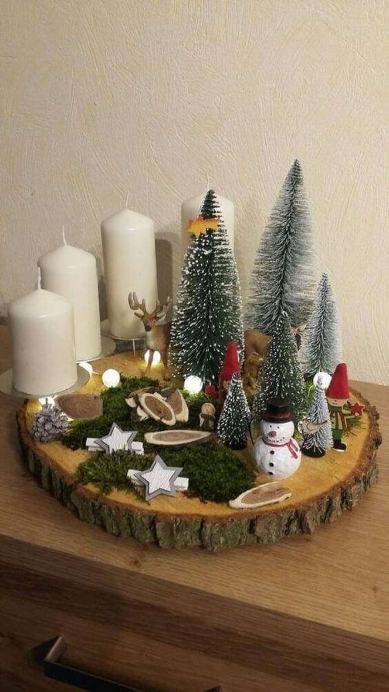 16. Estas velas de Natal brincam com as árvores. Foto: Pinterest