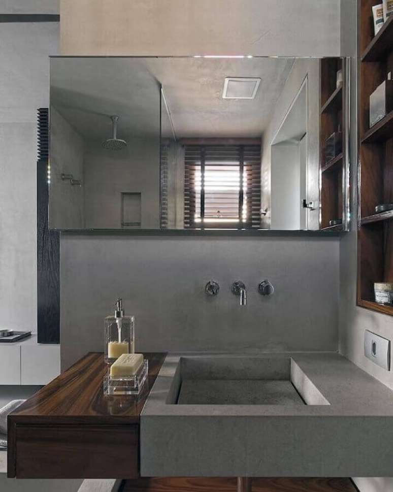 13. Invista no cimento queimado para revestimento cinza para banheiro moderno decorado – Foto: Diego Revollo