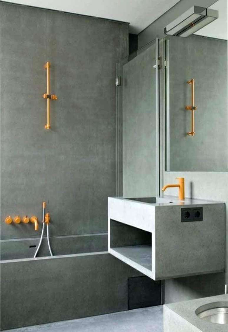20. Decoração moderna para banheiro cinza com detalhes amarelos na torneira – Foto: Air Freshener