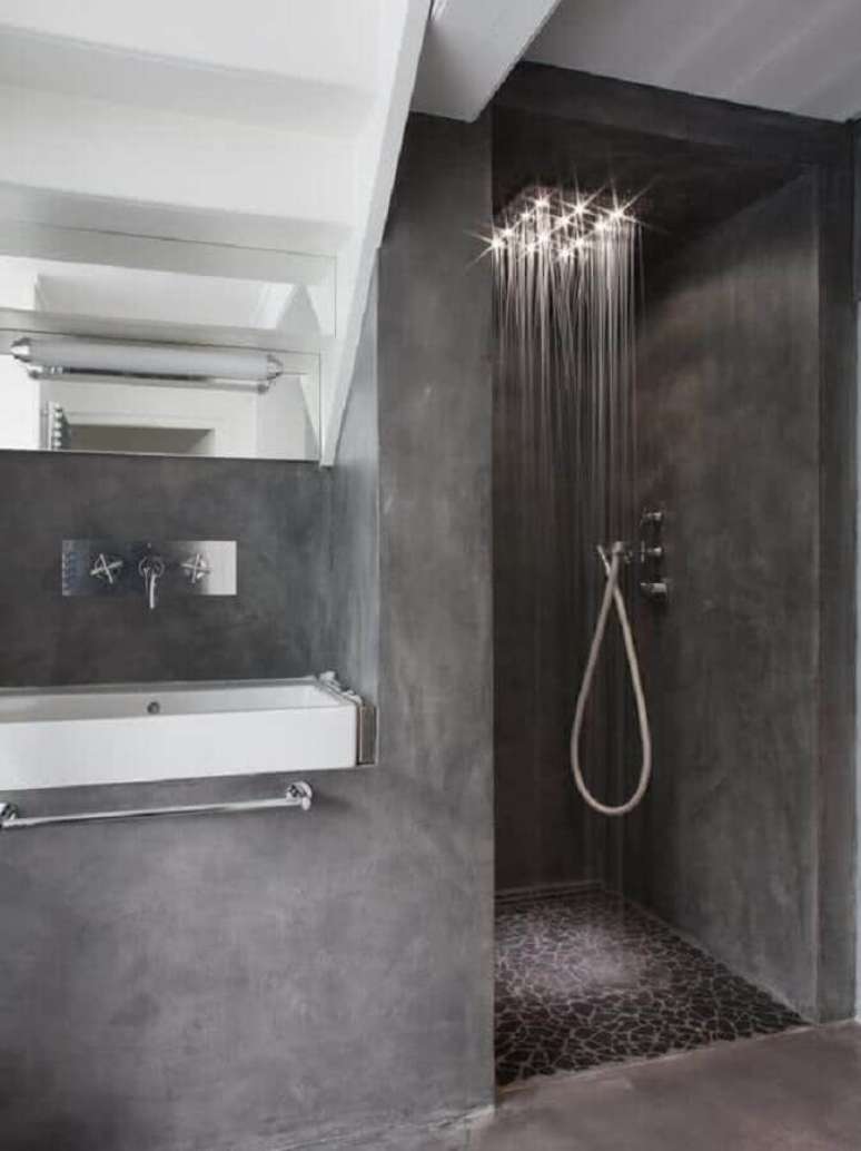 32. O cimento queimado é perfeito para a decoração do banheiro cinza moderno – Foto: Pinterest