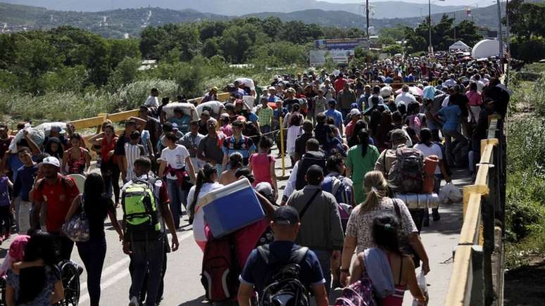 Migrantes venezuelanos, em foto de maio de 2018; plano de Guaidó prevê retorno deles para a 'reconstrução da Venezuela'