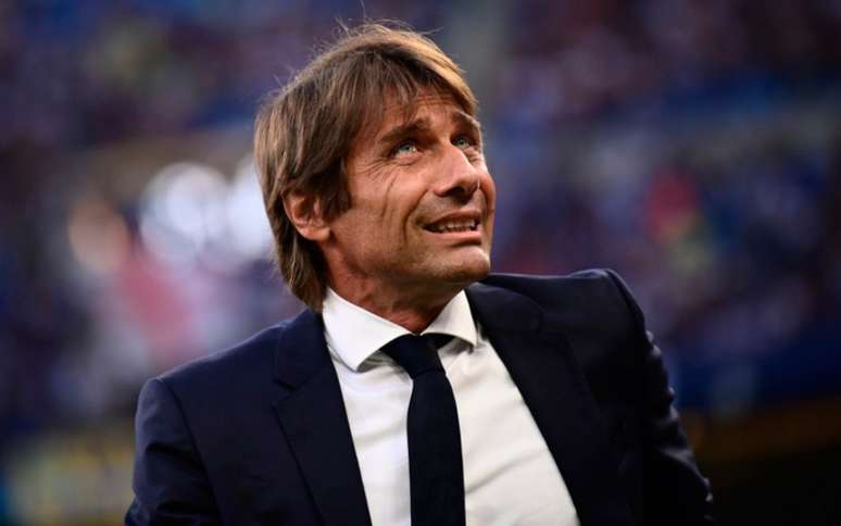 Antonio Conte comemorou o resultado diante do Borussia Dortmund (Foto:MARCO BERTORELLO/AFP)