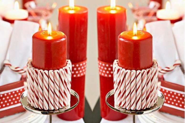 42. Como fazer enfeites de natal feitos com velas e caramelos coloridos ao redor. Foto: VIX