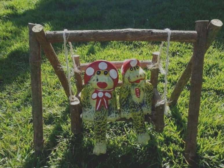 15. Os sapos quando utilizados como enfeites para jardim deixam o ambiente mais descontra&iacute;do. Fonte: Pinterest