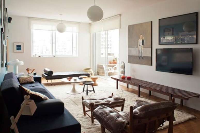 45. Poltronas para sala de tv com descanso para p&eacute;s. Fonte: Casa Vogue