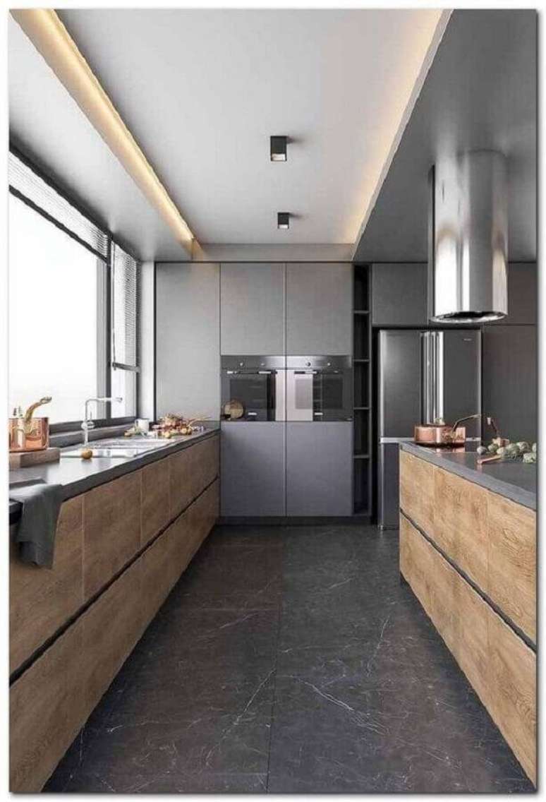 33. Decoração moderna para cozinha planejada grande com armários de madeira e bancada cinza – Foto: Pinterest