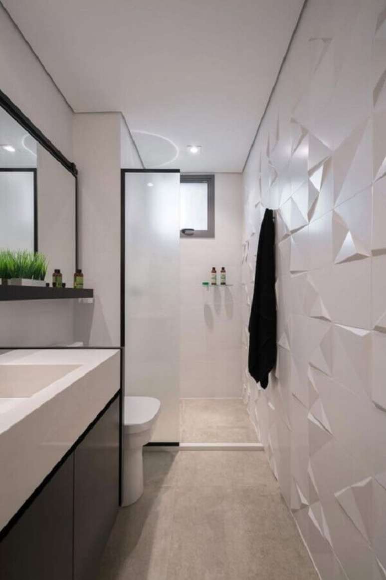 37. O revestimento 3D dá um toque mais moderno na decoração do banheiro branco – Foto: Revestindo Casa