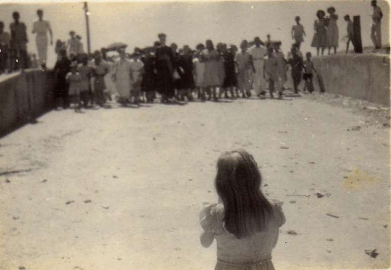 Antes de nova inunda&ccedil;&atilde;o, moradores se despediram da "Velha Nova Iorque" em prociss&atilde;o pela cidade