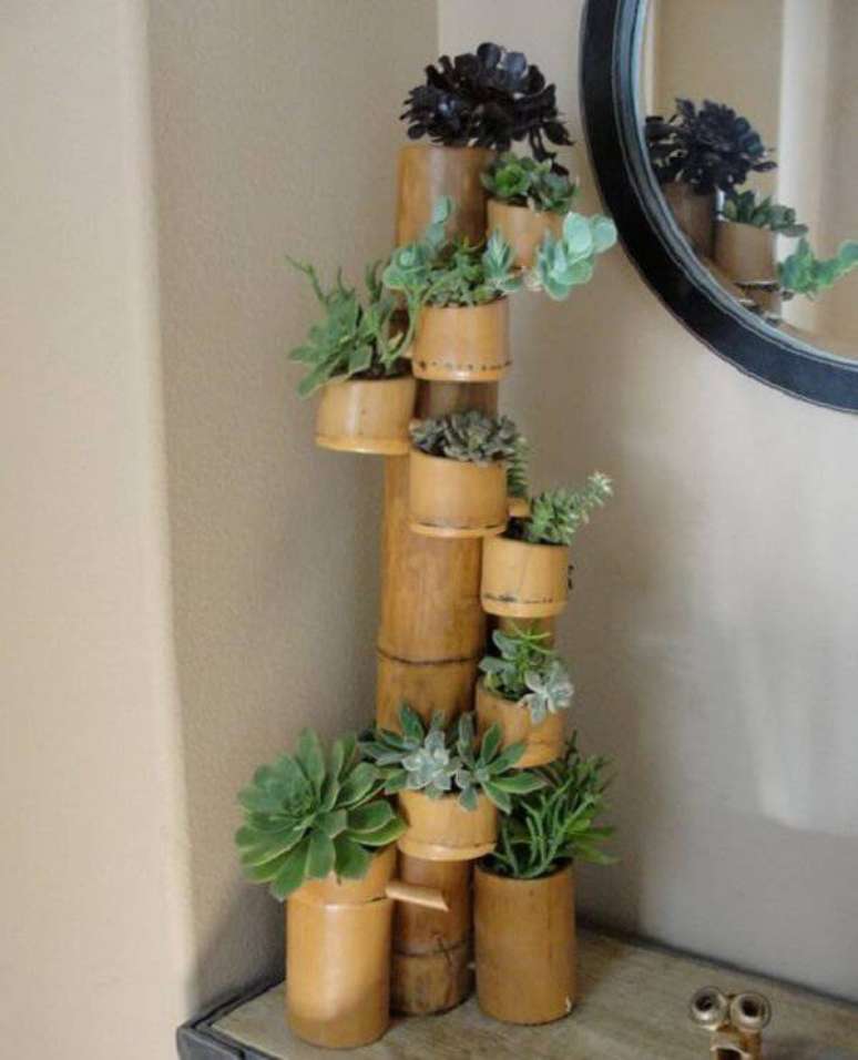 36. Suporte para plantas engenhoso criado a partir do artesanato com bambu. Fonte: Pinterest