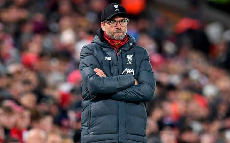 Jurgen Klopp foi convencido por jogadores a levar o elenco principal ao Qatar (Foto: PAUL ELLIS / AFP)