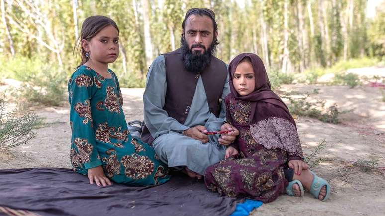 Qari Sayed Muhammed com suas filhas
