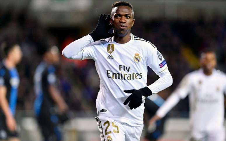 Vinícius Júnior comemorando seu gol na vitória do Real Madrid sobre o Club Brugge (Foto: JOHN THYS / AFP)