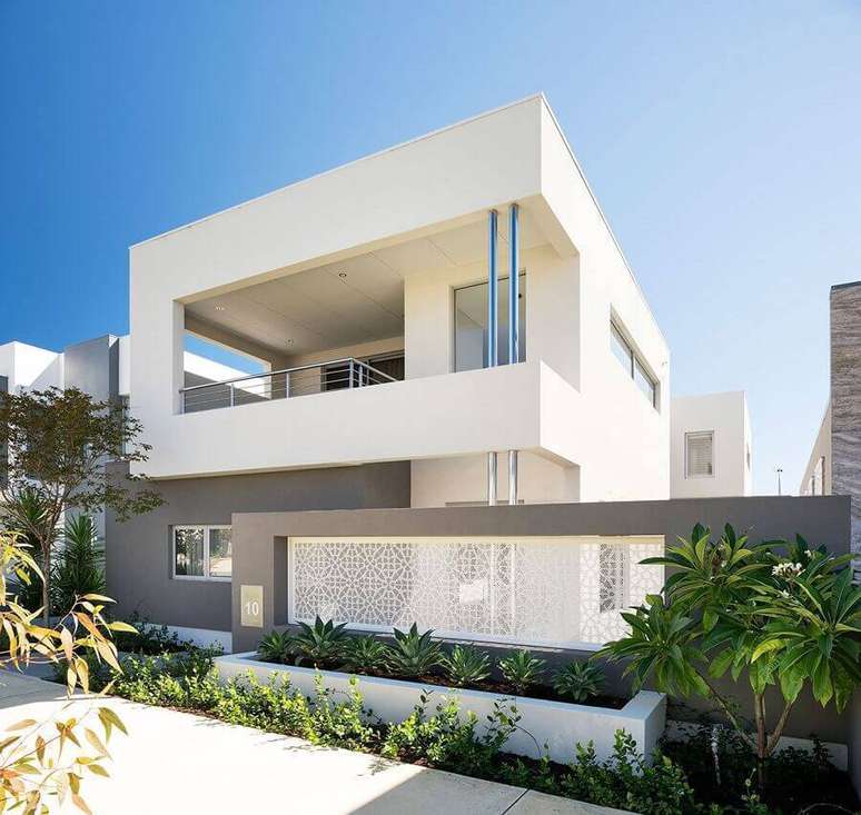 19. Linhas mais retas s&atilde;o bem presentes nas fachadas de casas lindas e modernas &ndash; Foto: Akhi Decor