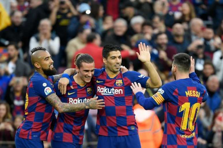Quarteto do Barcelona foi responsável pelos quatro gols marcados pelo time na partida (LLUIS GENE / AFP)