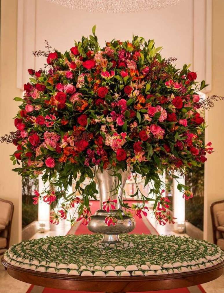 22. Decoração de casamento com flores vermelhas – Via: Pinterest