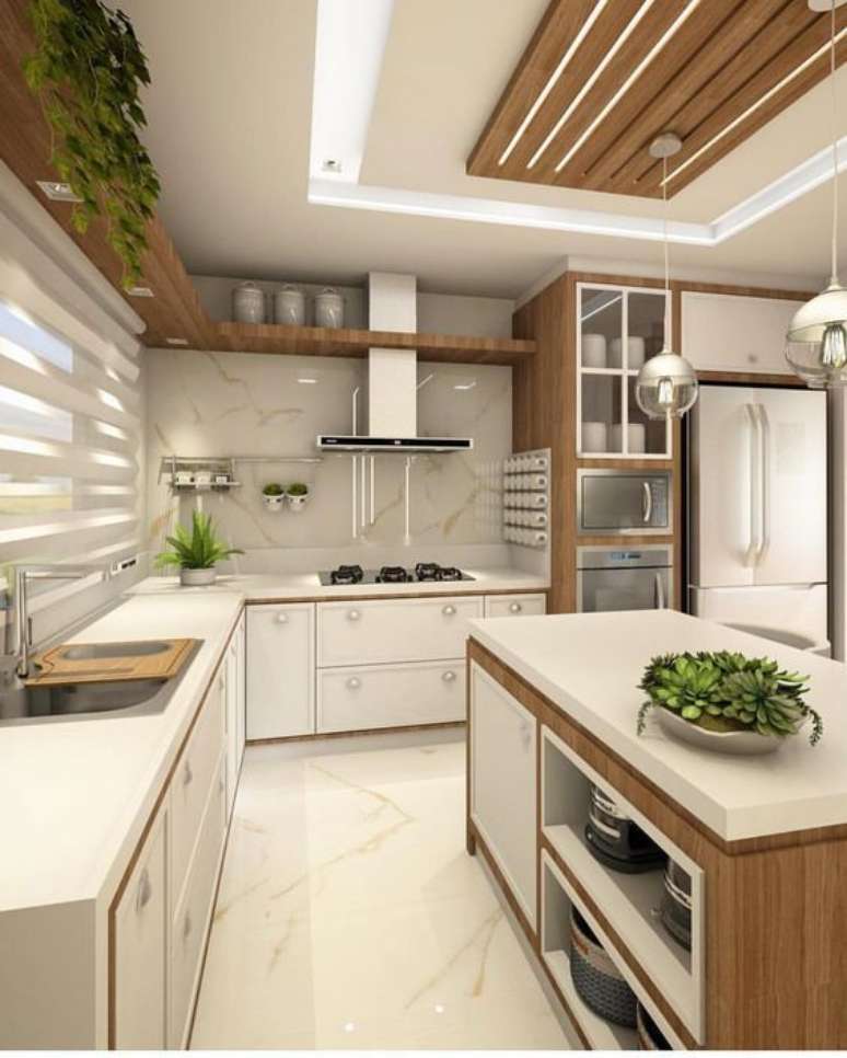 63. Sempre vale a pena usar mais de uma lumin&aacute;ria para cozinha. Foto: Crescendo aos Poucos