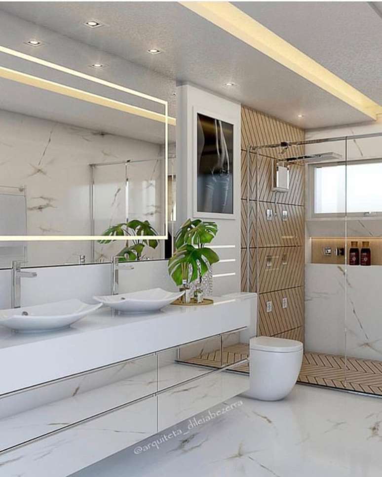 27. Banheiros costumam trabalhar com modelos mais lisos de bancada de porcelanato. Foto: Instagram
