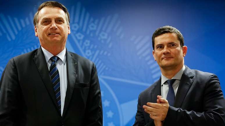 Presidente da República, Jair Bolsonaro, e o Ministro de Estado da Segurança Pública, Sérgio Moro, durante solenidade de assinatura da MP para Confisco de Bens de Traficantes, em junho de 2019