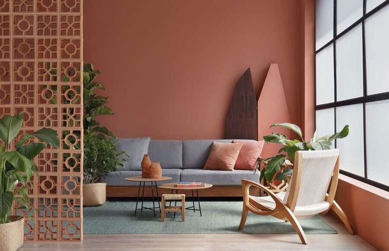 27. Cor terracota para decoração de sala de estar minimalista – Foto: Vitares Interiores