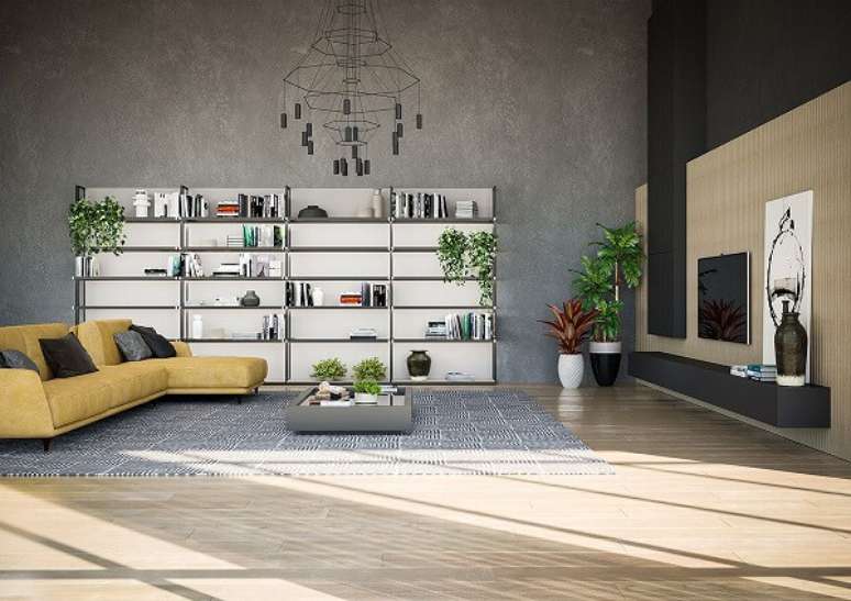 47. Sala de estar ampla com sof&aacute; amarelo com chaise. Fonte: Pinterest