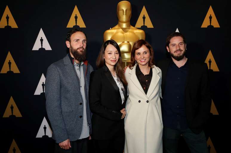 Shane Boris, Joanna Natasegara, Petra Costa e Tiago Pavan, indicados ao Oscar de melhor documentário, durante recepção na Academia de Artes e Ciências Cinematográficas de Beverly Hills, Califórnia, EUA
04/02/2020
REUTERS/Mario Anzuoni

O americano Shane Boris, a produtora britância Joanna Natasegara, a diretora Petra Costa o produtor Tiago Pavan, indicados ao Oscar de documentário Foto: VALERIE MACON / AFP


lls, California, U.S., February 4, 2020. REUTERS/Mario Anzuoni