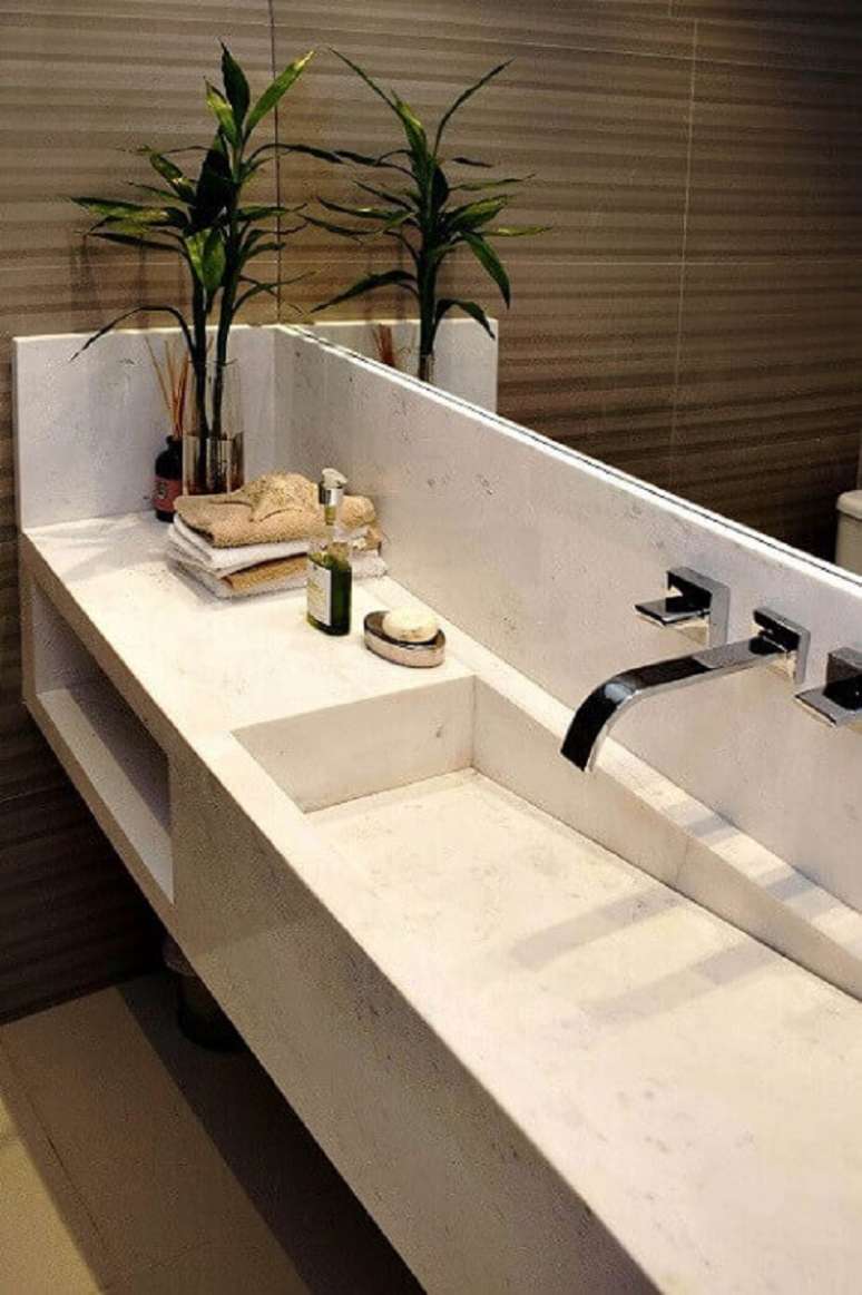 31. Elegante cuba para banheiro esculpida em mármore. Fonte: Pinterest