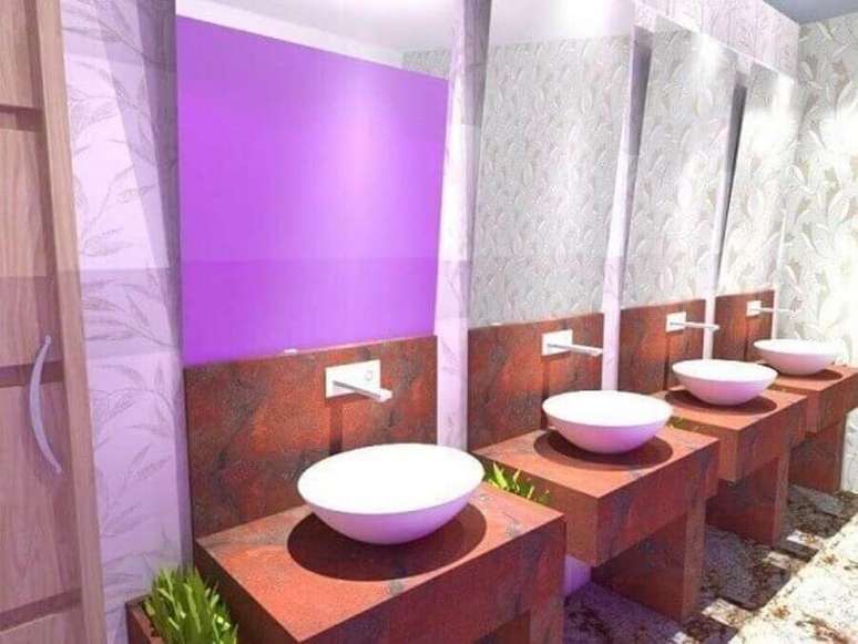 20. Bancada de banheiro de granito rosa com cuba de porcelana redonda &ndash; Foto: Pinterest