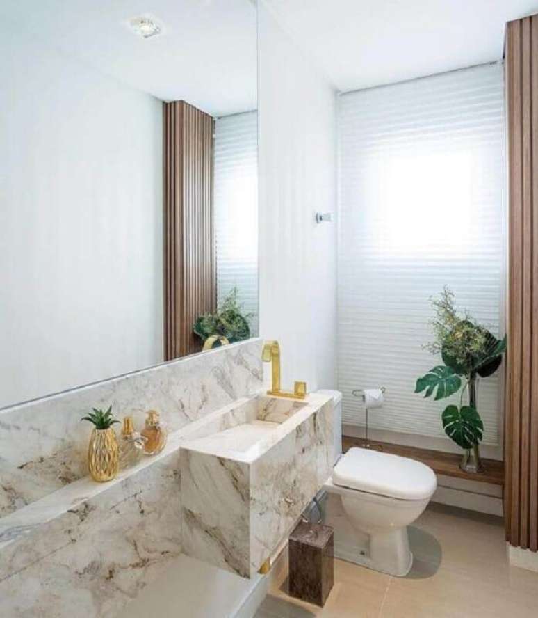 7. A bancada de mármore para banheiro sempre garante um visual elegante para o ambiente – Foto: Dicas Decor