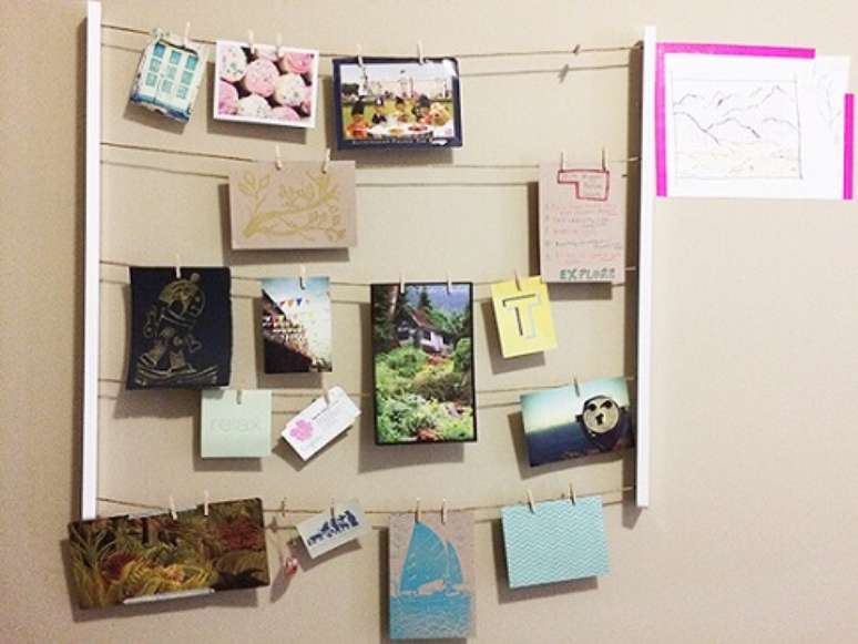 44. Seu varal de fotos pode tamb&eacute;m ter uma estrutura de madeira como essa