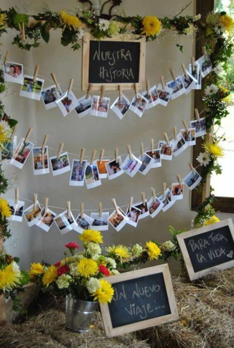 70. Varal de fotos com flores &ndash; Via: Pinterest