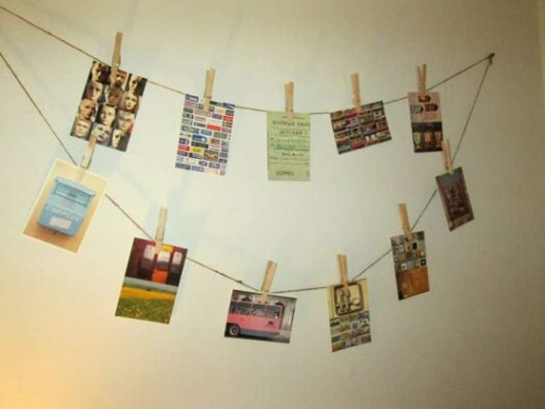 16. Ou ainda colocar postais de lugares para onde j&aacute; viajou com o varal de fotos