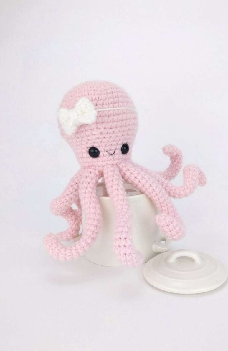 43- Modelo de polvo de crochê em tom rosa bebê. Fonte: Pinterest