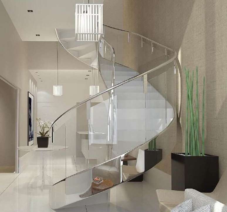 20. Estilo moderno de escada com detalhes em inox e vidro