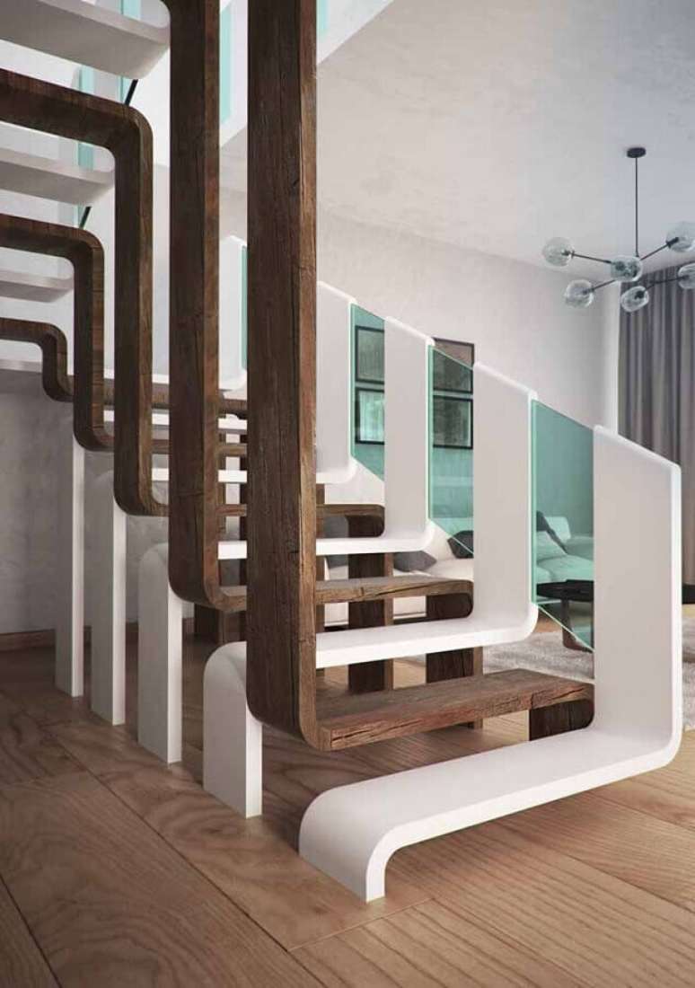 60. Escada moderna com corrim&atilde;o de vidro &ndash; Foto: Assetproject