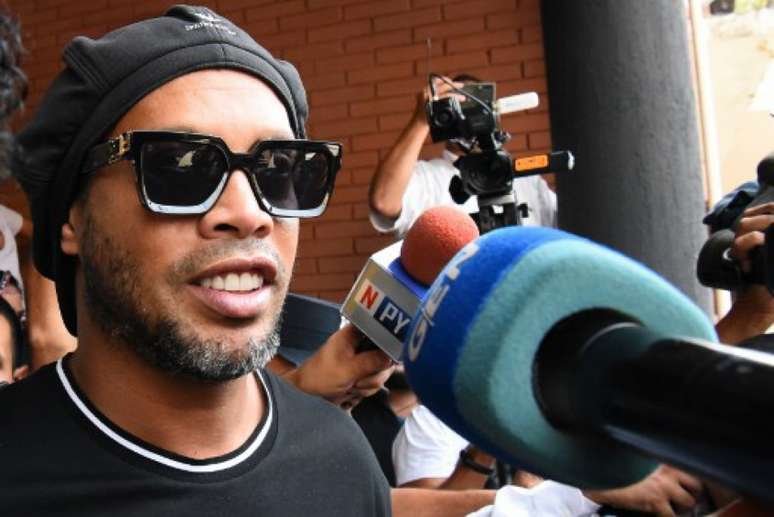 Ronaldinho deixou aPromotoria sem falar com a imprensa(Foto: NORBERTO DUARTE / AFP)