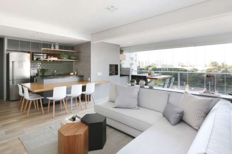 49. Aqui, o sof&aacute; em L integra os espa&ccedil;os. Projeto de Degrad&ecirc; Decora&ccedil;&atilde;o