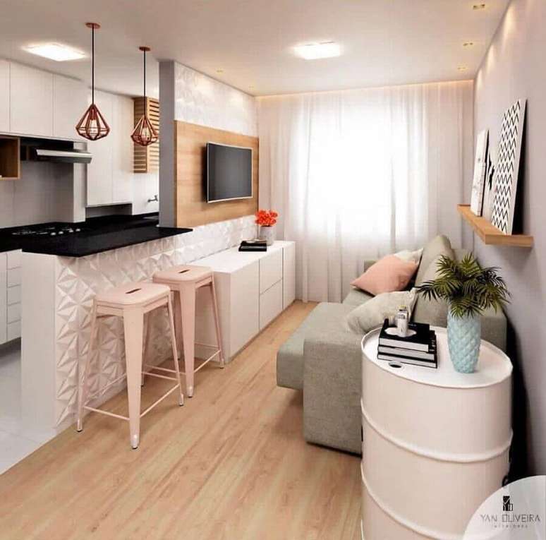 3. Revestimento 3D para decoração de cozinha americana com sala de estar com painel de madeira para TV – Foto: Yan Oliveira