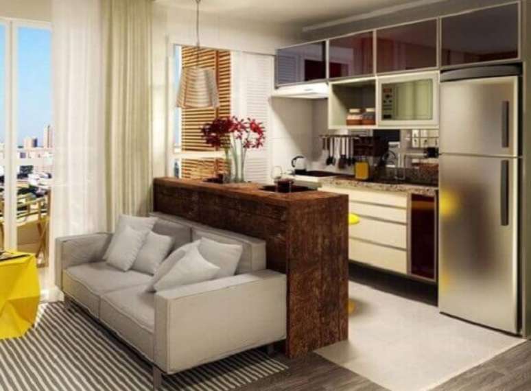 10- Cozinha americana pequena com sala simples em apartamento tipo Studio. Fonte: Webcomunica