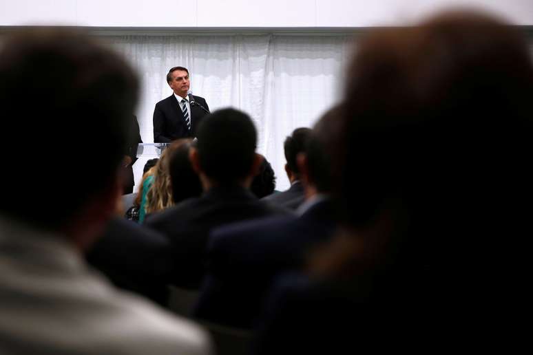Presidente Jair Bolsonaro fala durante reunião com a comunidade brasileira no Miami Dade College Auditorium. REUTERS/Marco Bello