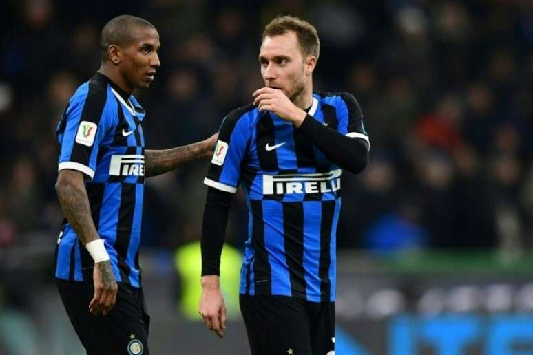 Ashley Young e Eriksen foram os reforços de janeiro da Inter de Milão (AFP Photo/Miguel MEDINA)