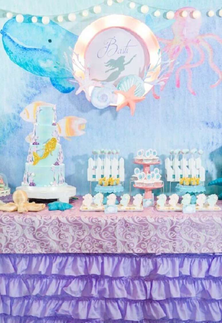 5. Cores claras e delicadas são ideias para a decoração de festa da sereia – Foto: Baby and Breakfast
