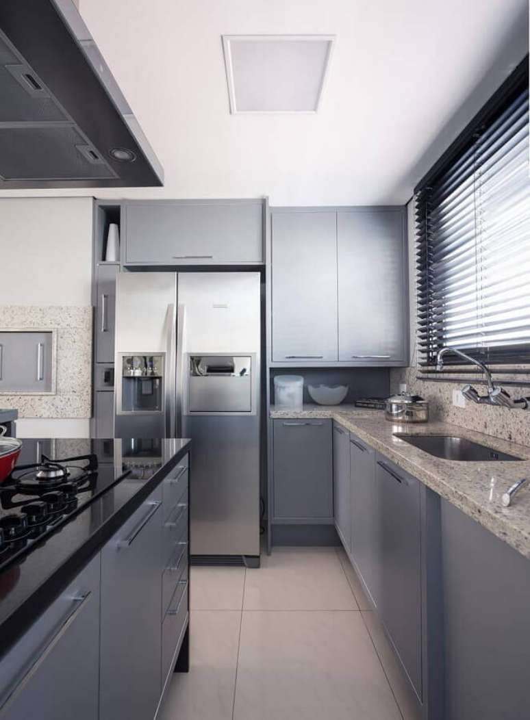 10. É importante saber como escolher o melhor modelo de armário de cozinha para a sua casa – Foto: Blacher Arquitetura
