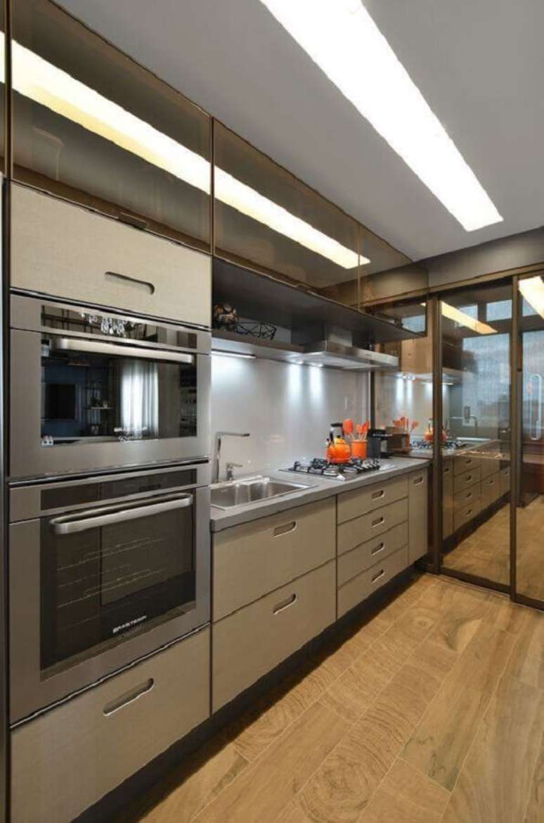 15. Escolha o armário de cozinha conforme o estilo de decoração desejado para o ambiente – Foto: Architizer