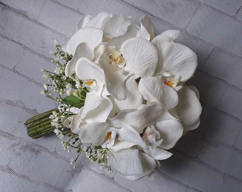 32. Um buque de orquídeas brancas transmitem muita delicadeza – Foto: Via Pinterest