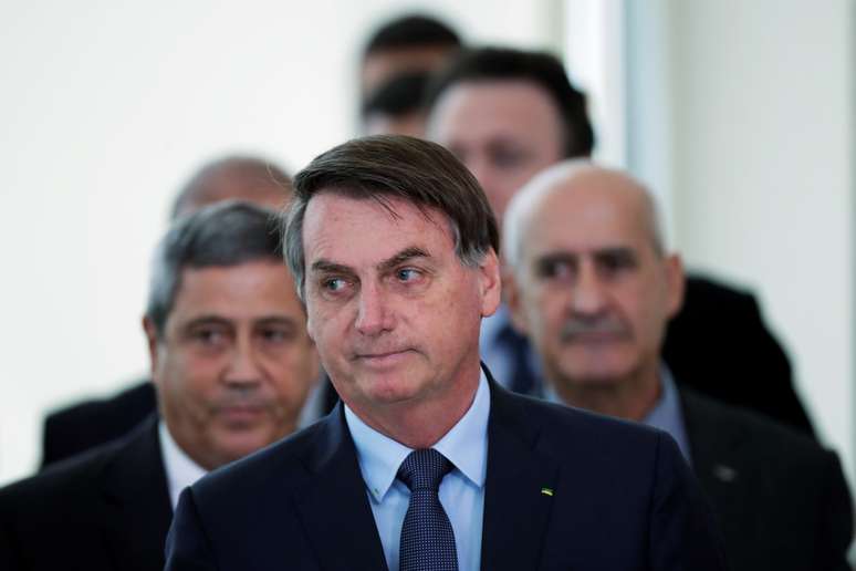 Presidente Jair Bolsonaro chega a salão do Palácio do Planalto para pronunciamento
01/04/2020
REUTERS/Ueslei Marcelino