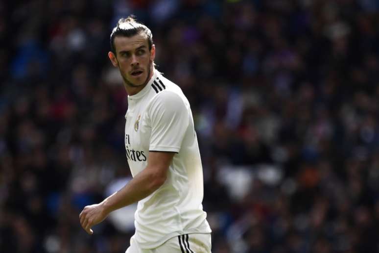Papel higiênico? Não, Bale usou uma bola de golfe (Foto: AFP)